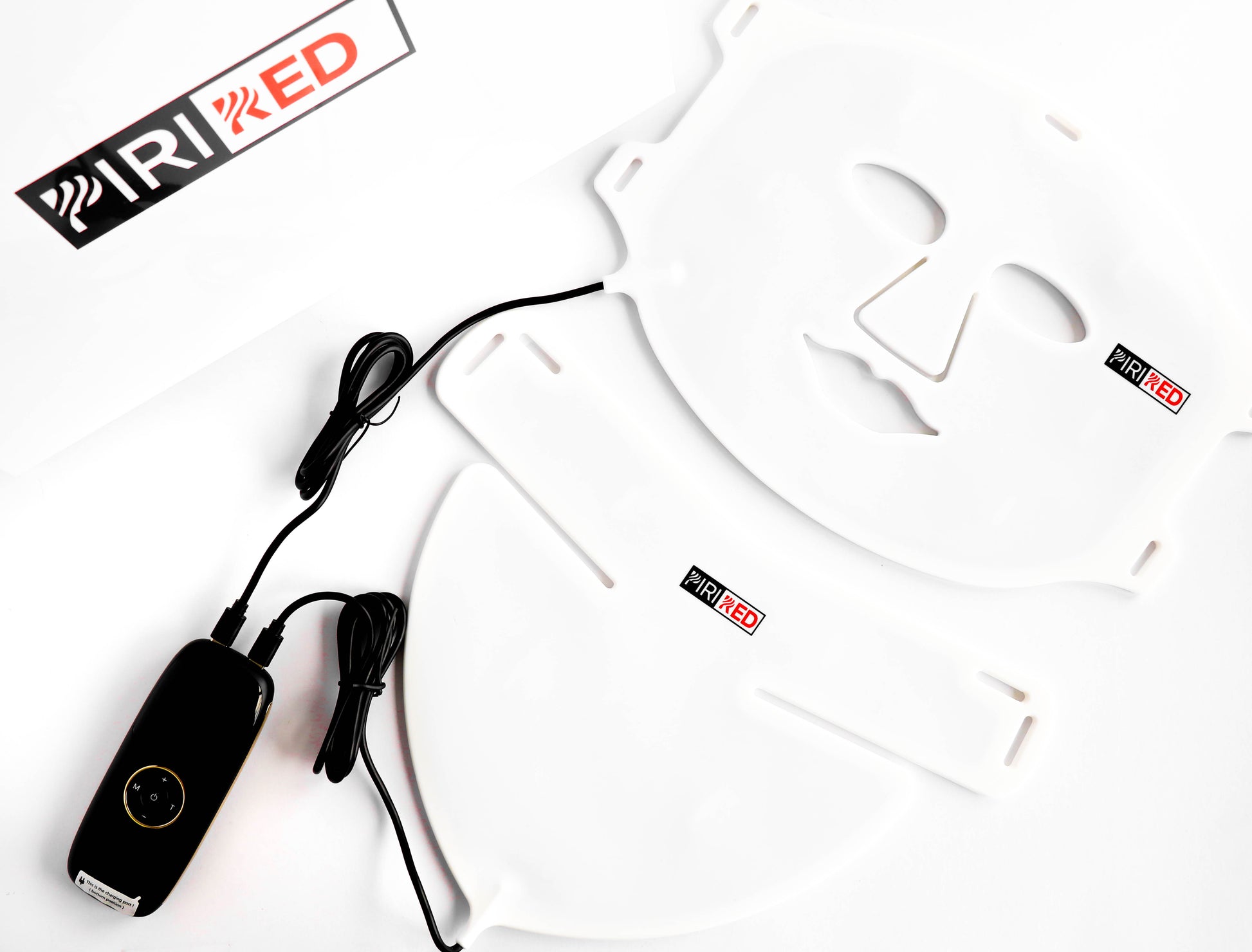 A red light therapy mask and decollete device with straps, eye covers, and a control unit, against a white background.